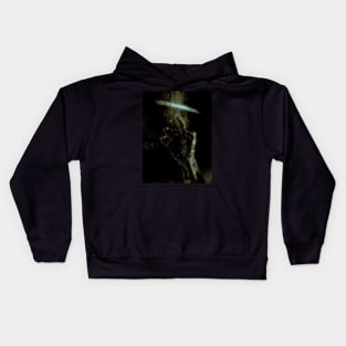 Digital collage and special processing. Person looking on his hand. Bizarre, dark. Colorful. Brown and dirt. Kids Hoodie